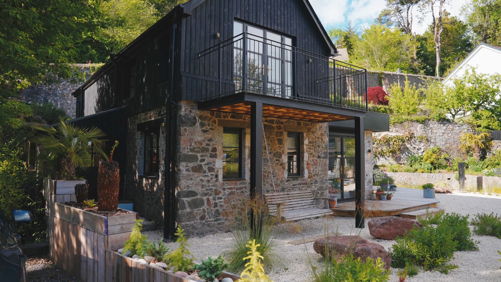 Stone and dark timber exterior of Siobhan’s home